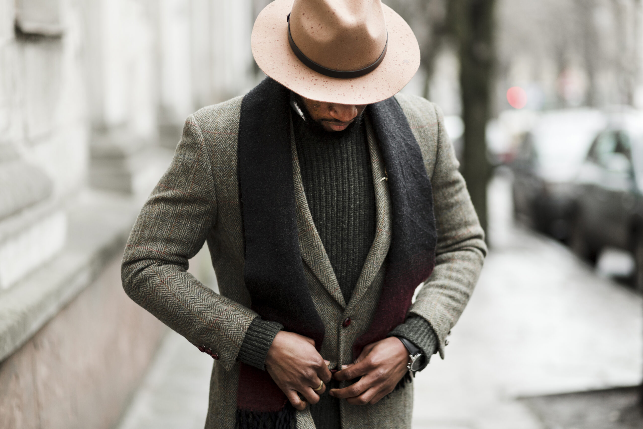 handsome-man-putting-his-jacket